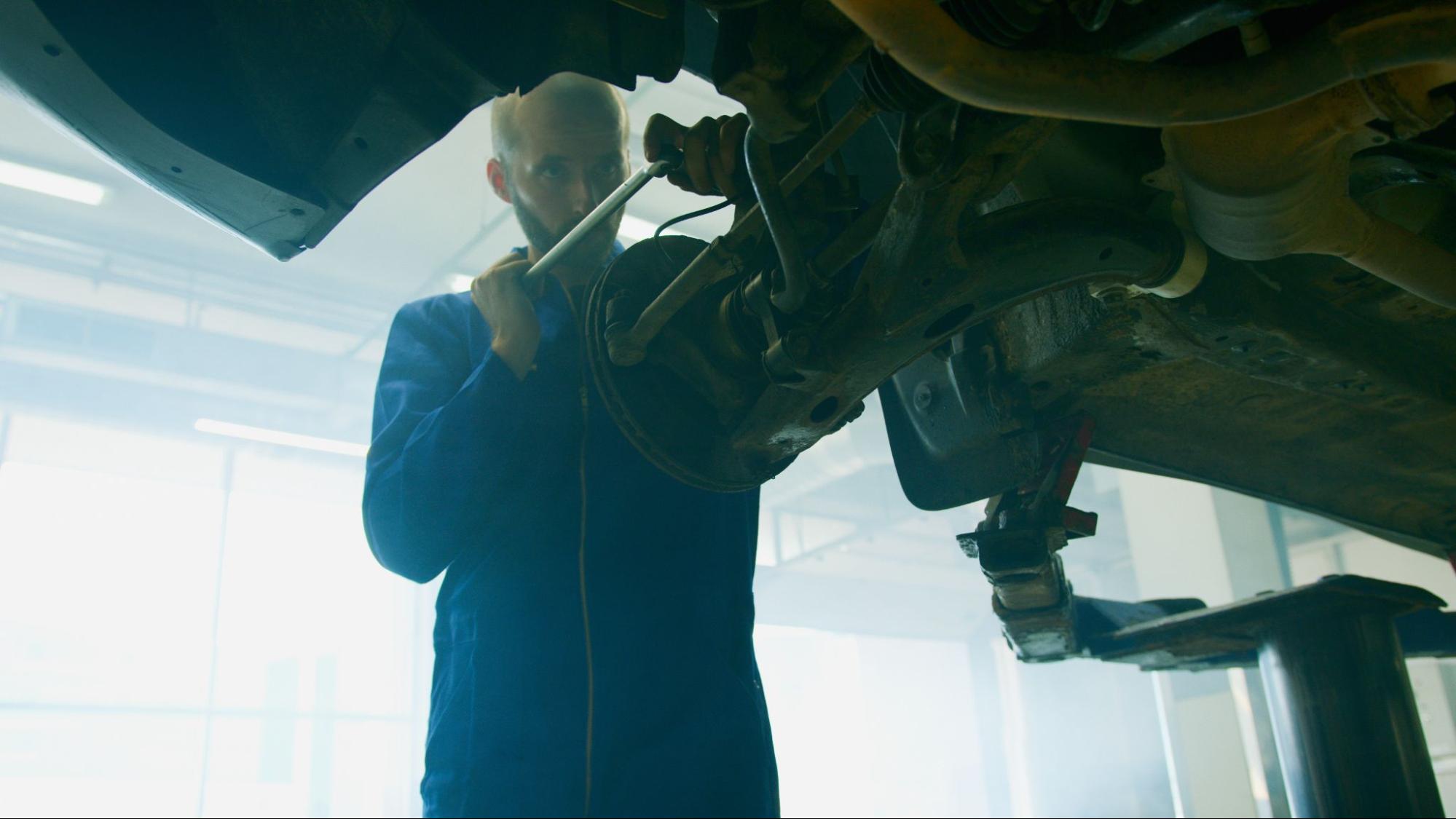 Mechanic working on a vehicle